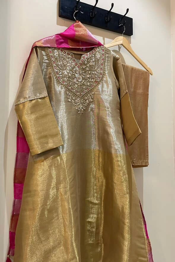 “VANSHIKA” ✨ Glow like gold A-line shimmer tissue suit set