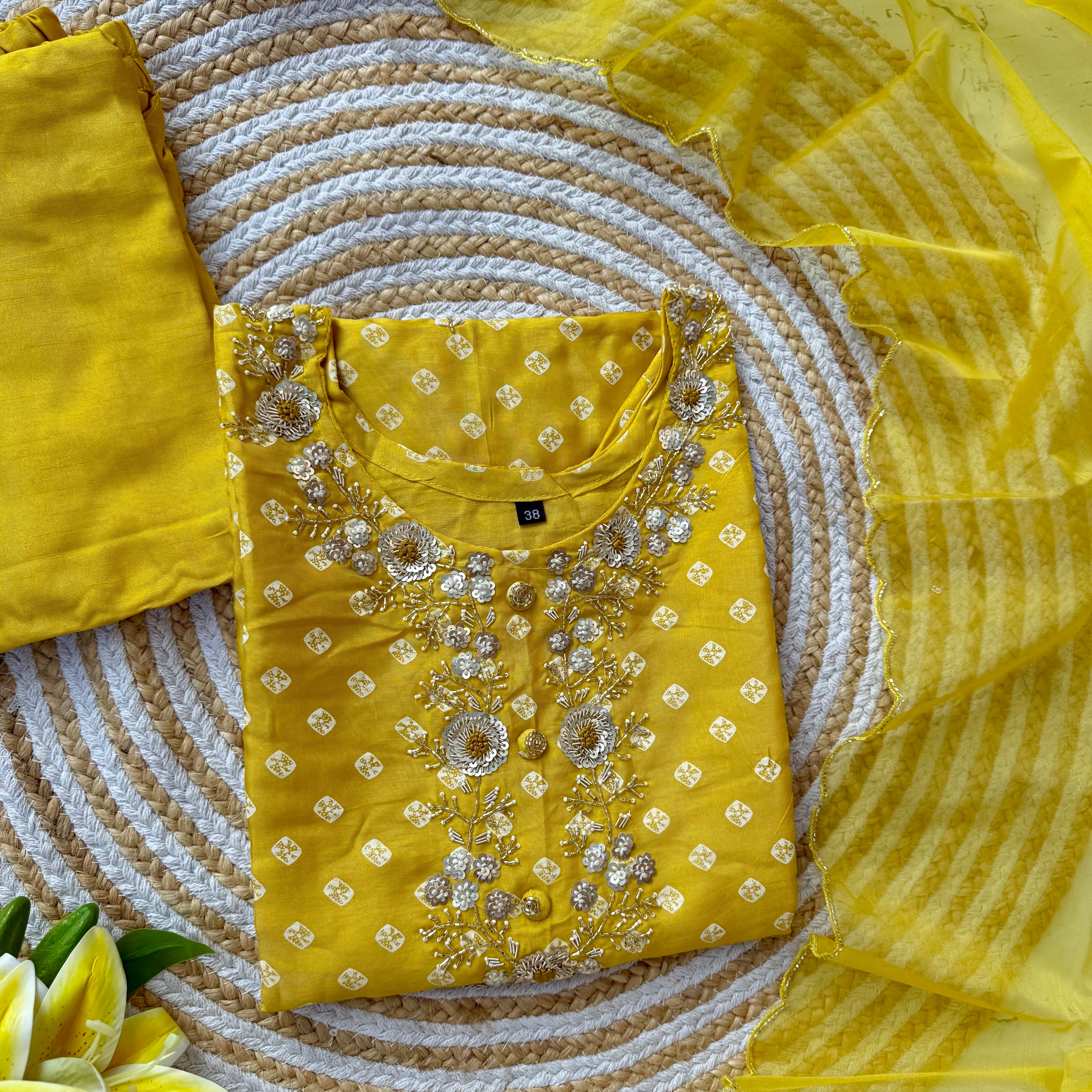 ‘’ BHANDEJ” Beautiful yellow shade bhandej dola silk set