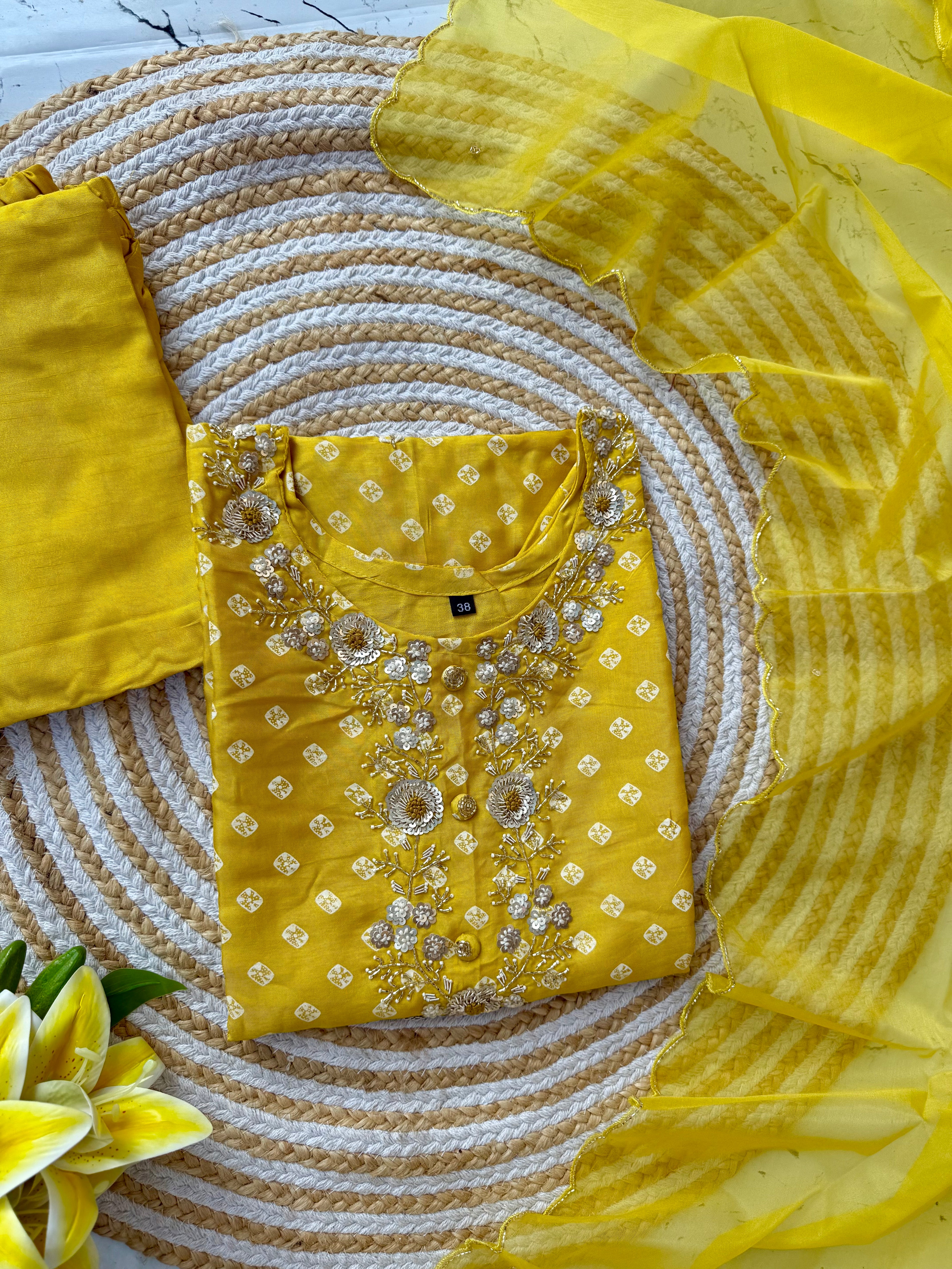 ‘’ BHANDEJ” Beautiful yellow shade bhandej dola silk set