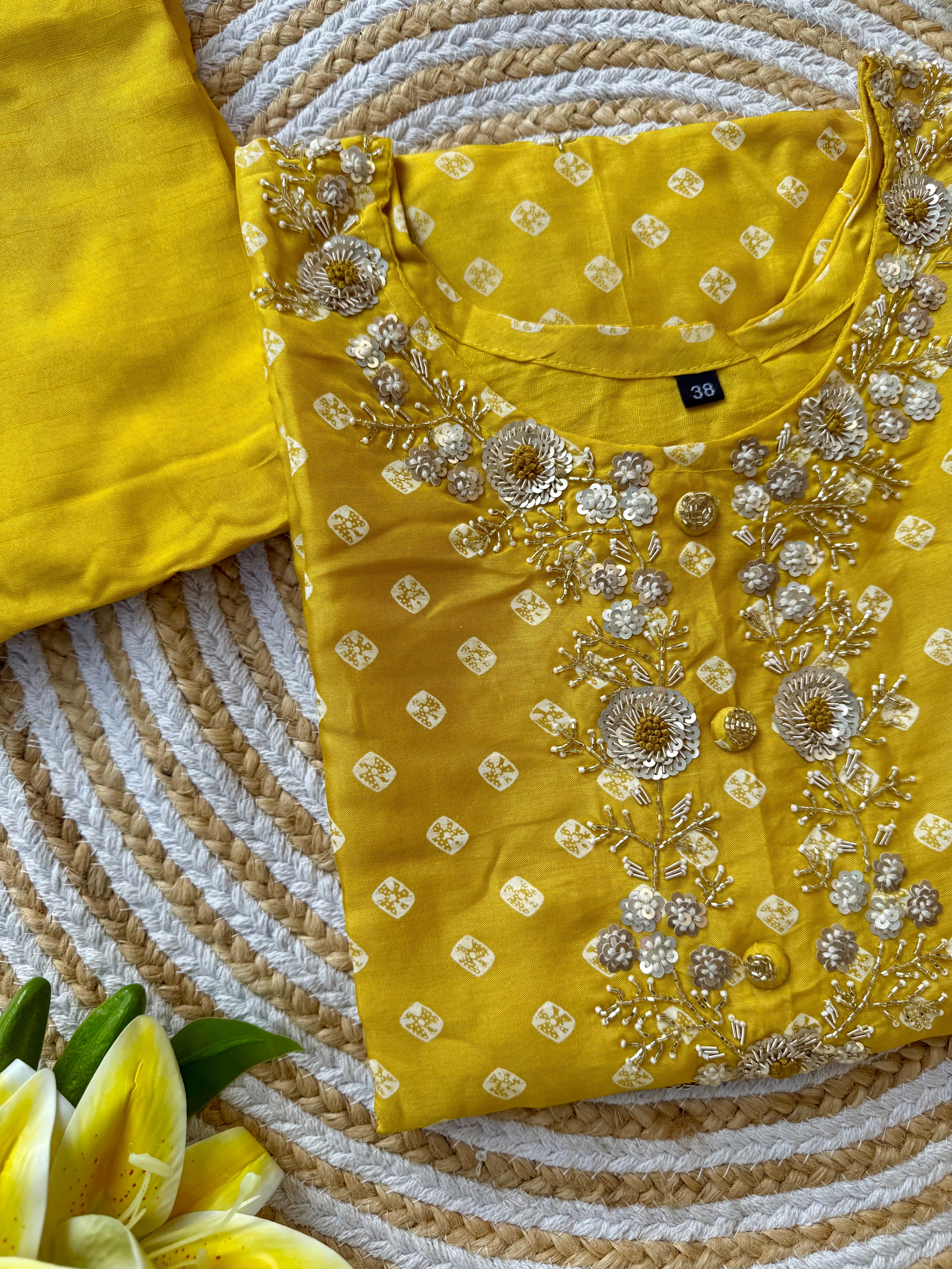 ‘’ BHANDEJ” Beautiful yellow shade bhandej dola silk set