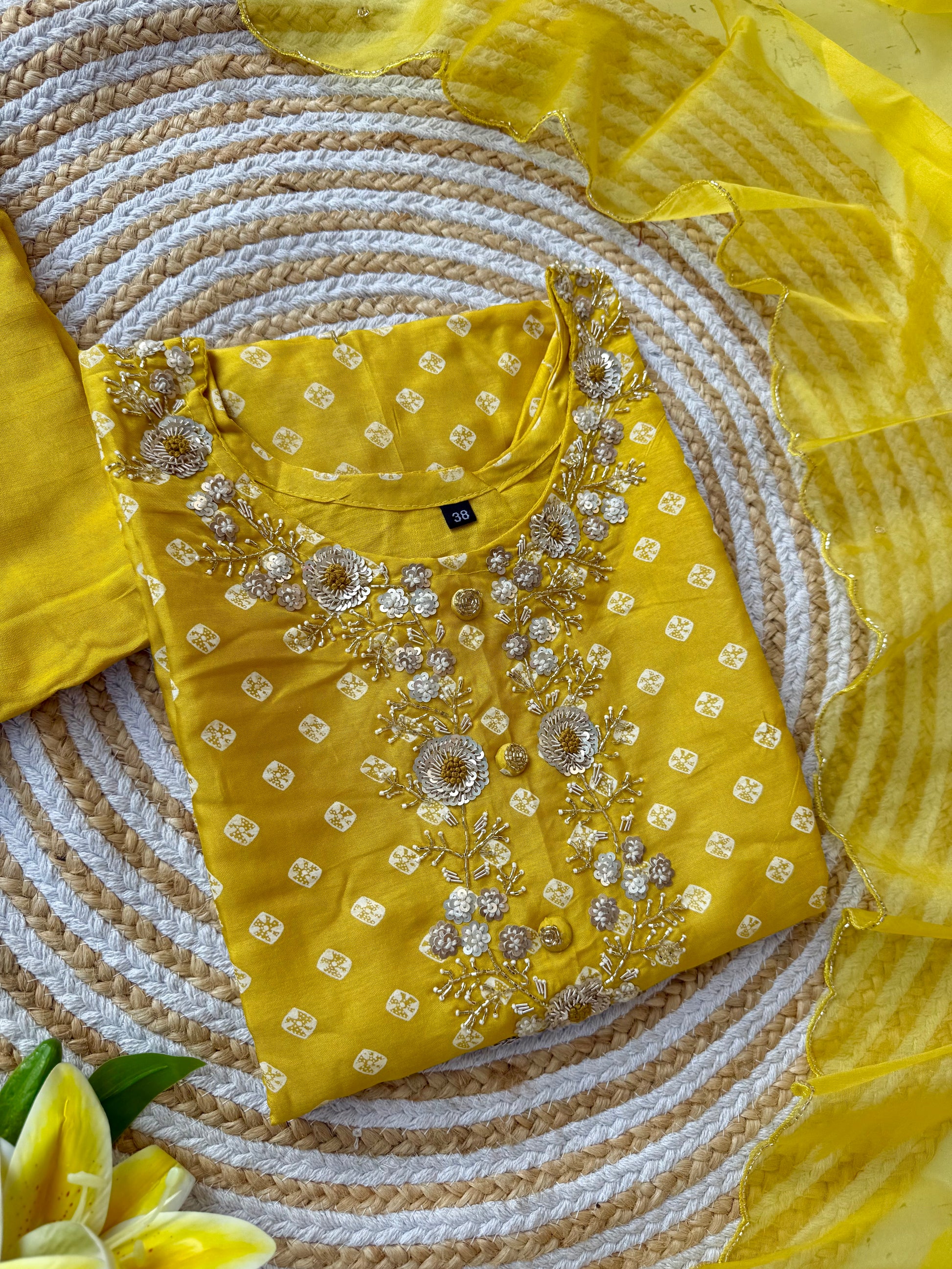 ‘’ BHANDEJ” Beautiful yellow shade bhandej dola silk set