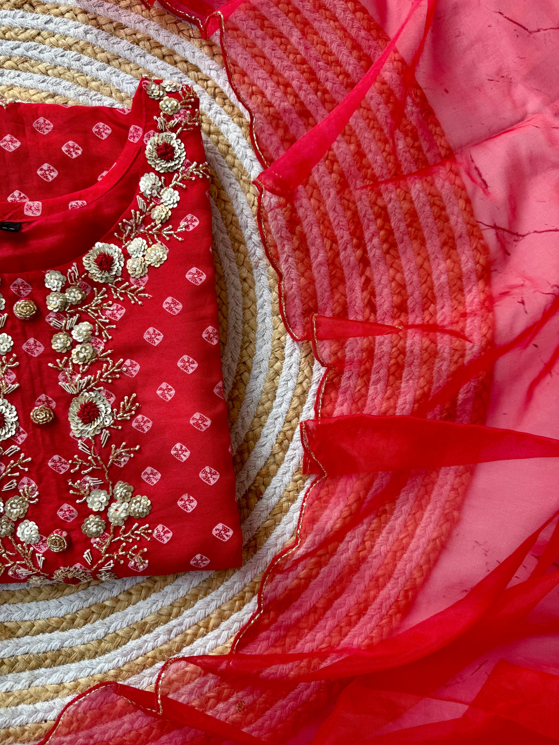 ‘’ BHANDEJ” Beautiful red shade bhandej dola silk set