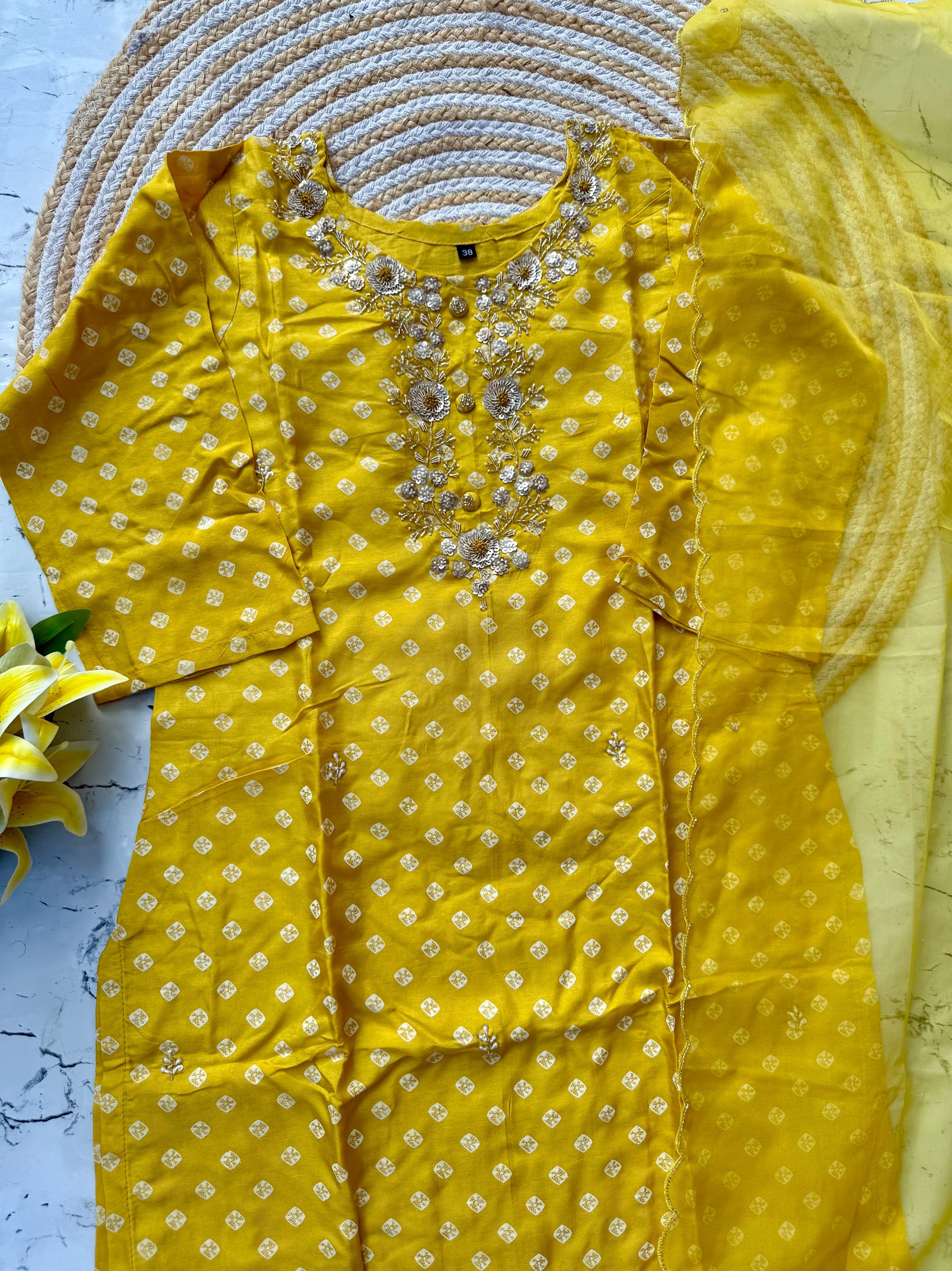 ‘’ BHANDEJ” Beautiful yellow shade bhandej dola silk set