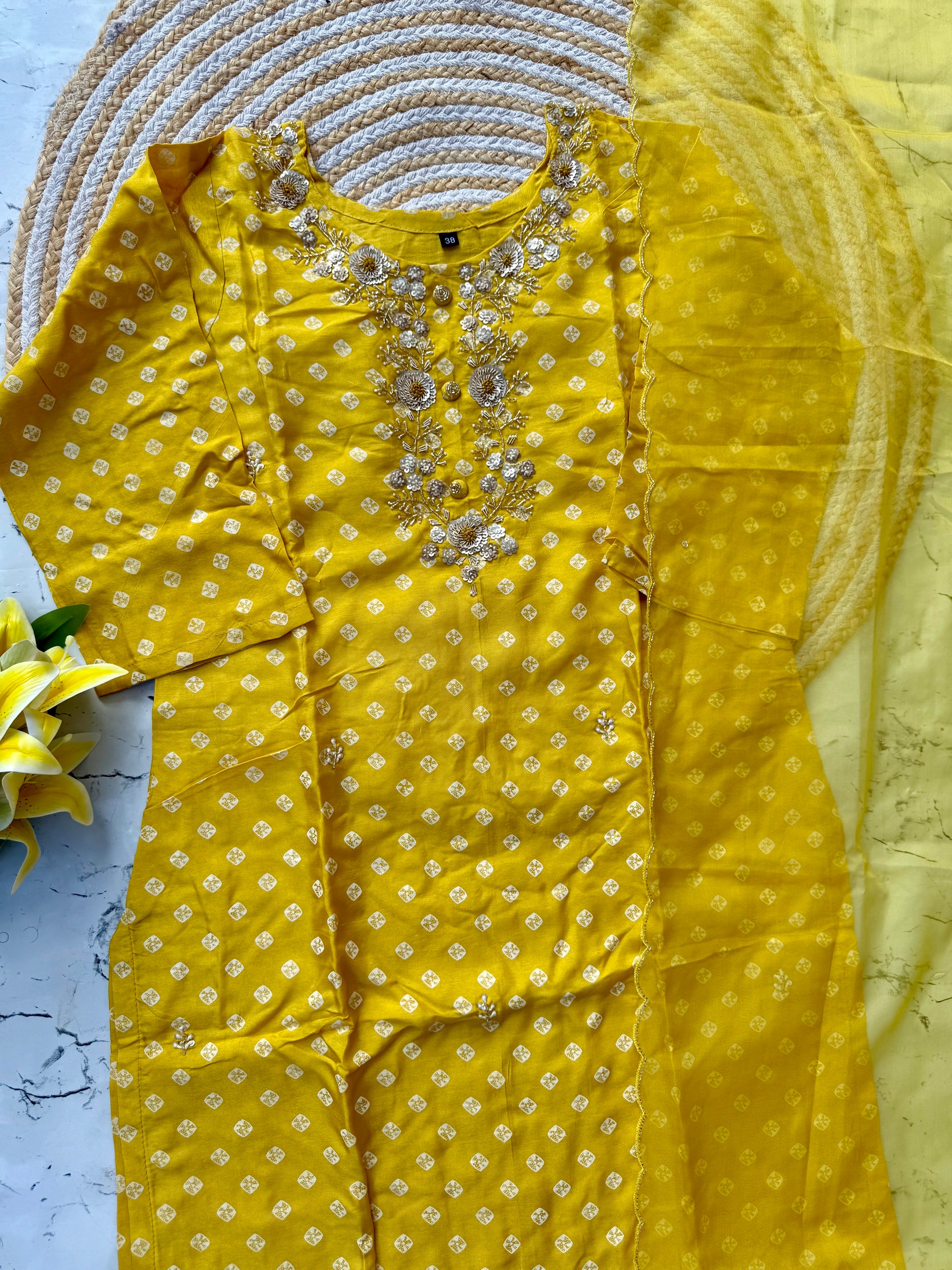 ‘’ BHANDEJ” Beautiful yellow shade bhandej dola silk set