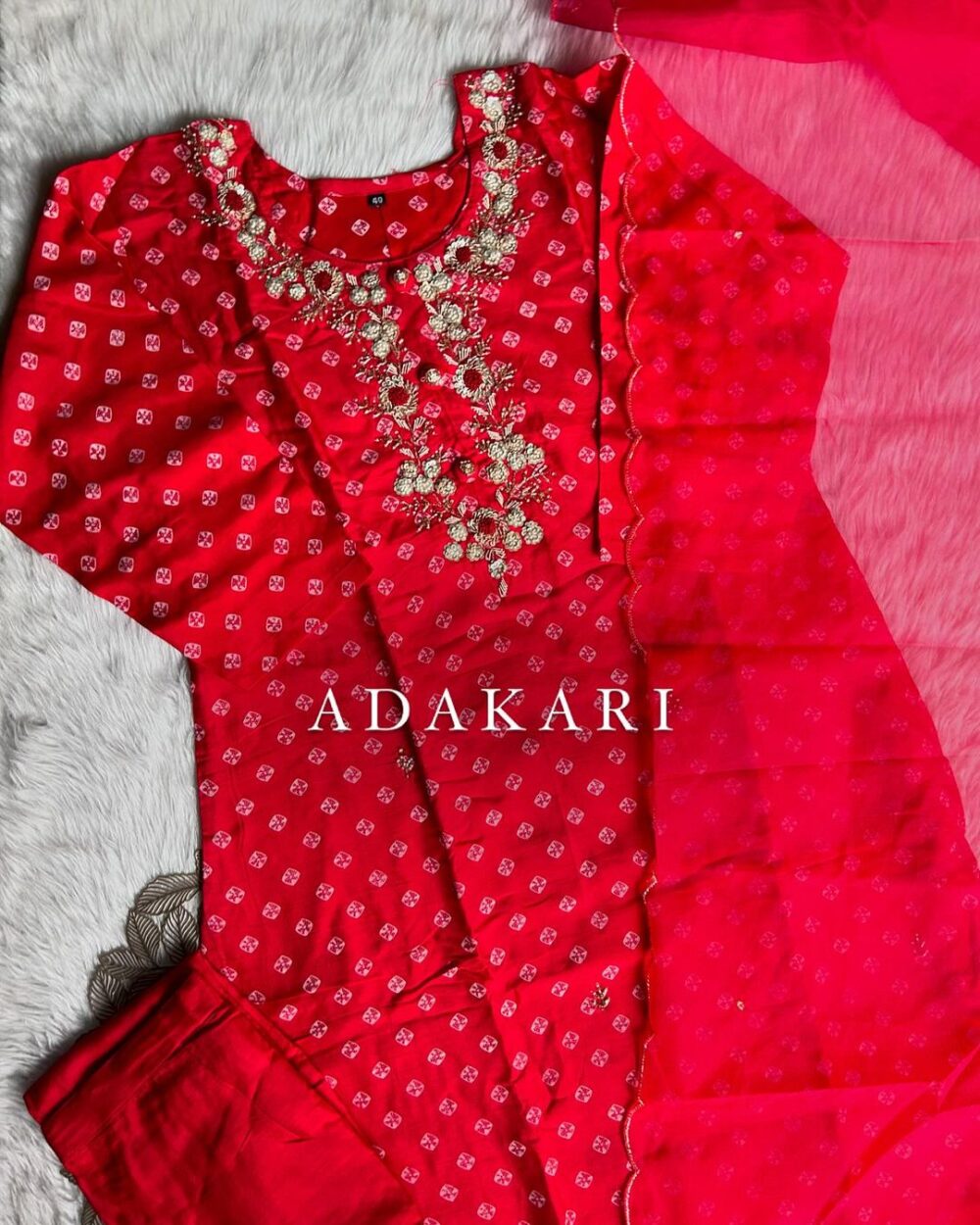 ‘’ BHANDEJ” Beautiful red shade bhandej dola silk set