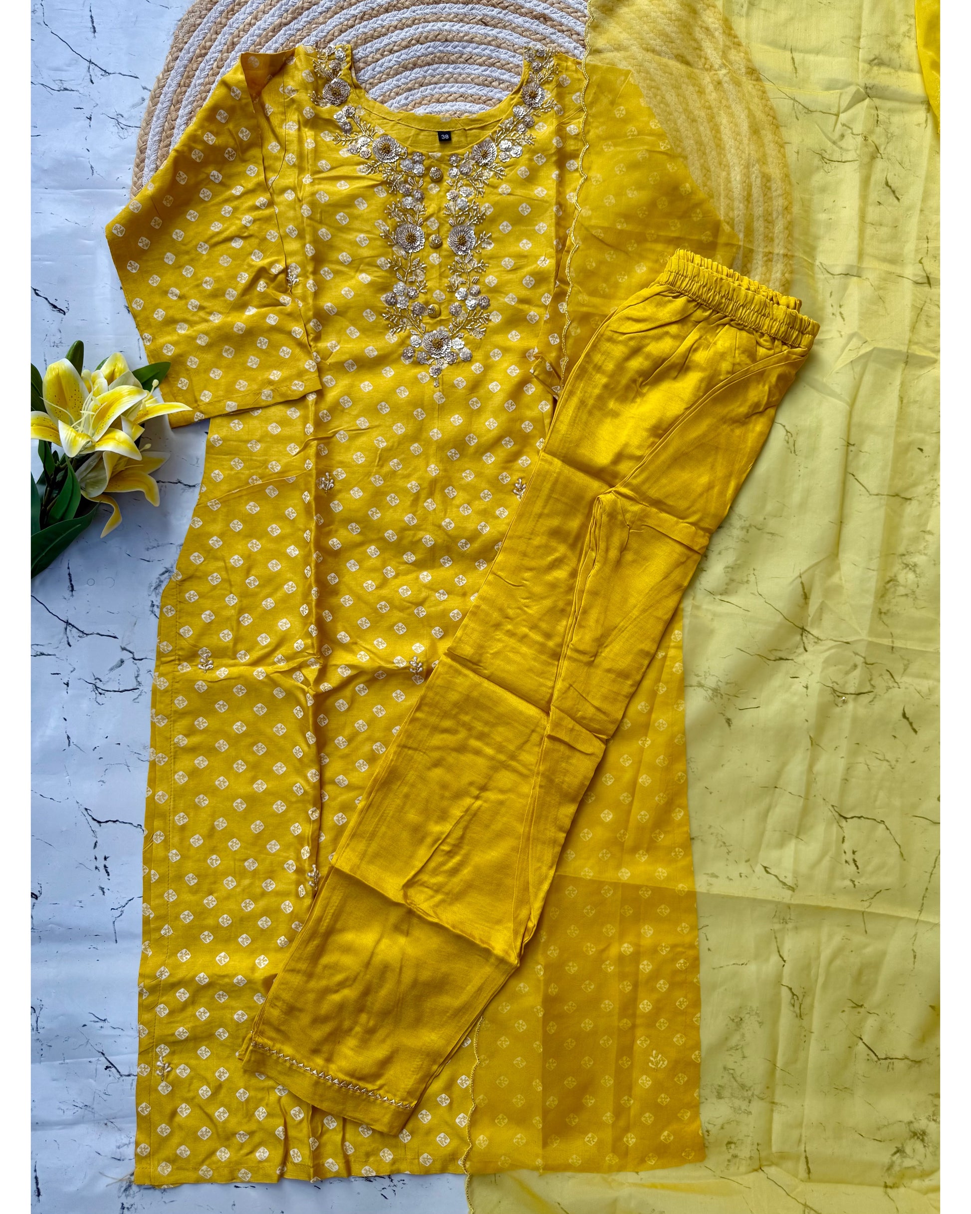 ‘’ BHANDEJ” Beautiful yellow shade bhandej dola silk set