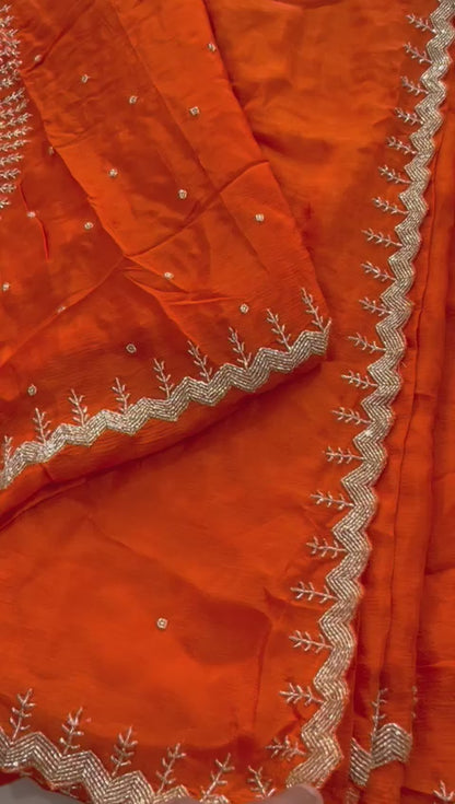 "Yashvi" Beautiful orange Pure Chinnon handwork saree